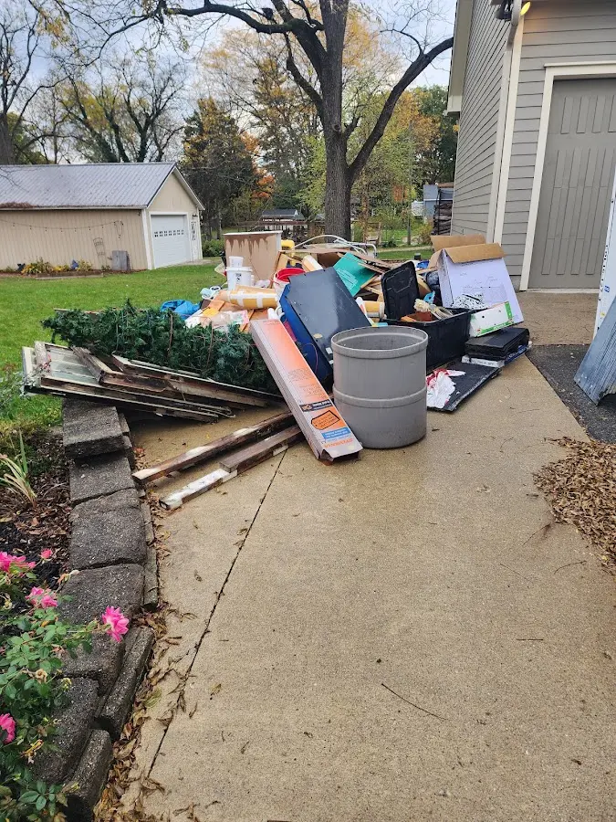 Dumpster being loaded with debris for 30 Yard Dumpster Rental in Annapolis Neck